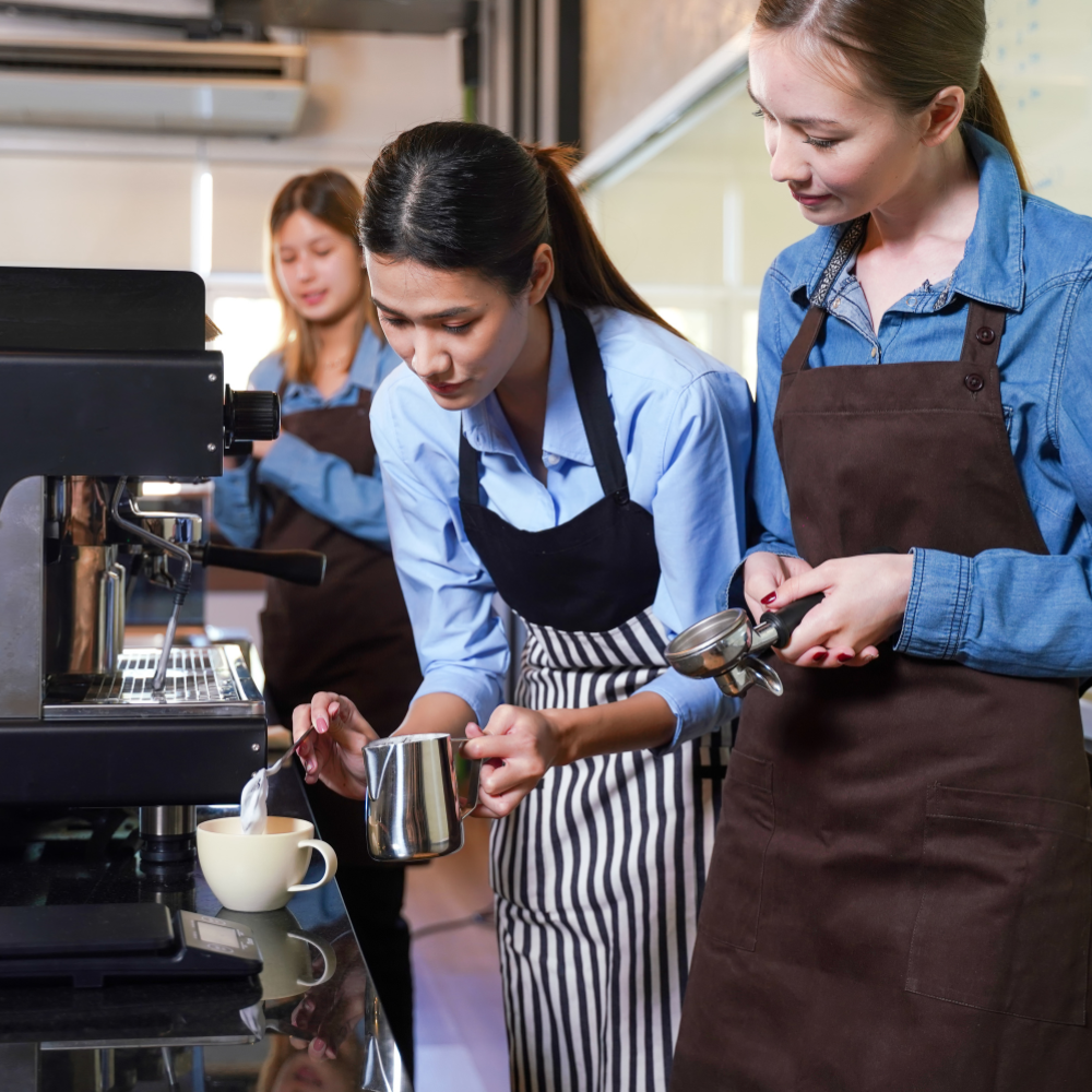 Baristas making coffee, barista training, espresso machine equipment