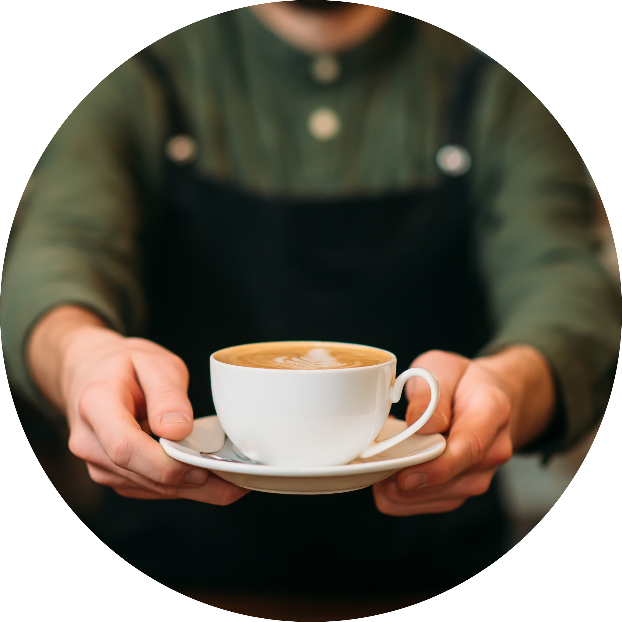Barista holding a cappuccino, craft coffee, latte art