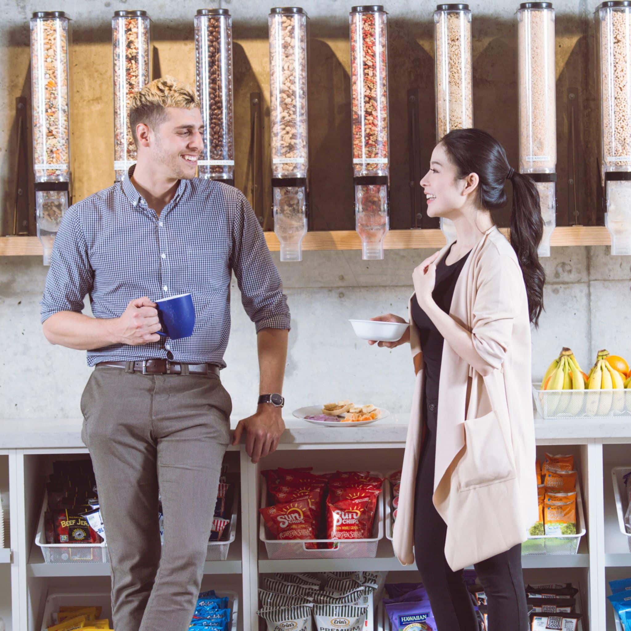 Two people talking while holding fresh food and coffee, ptwmt pantry service, fresh fruit and snacks