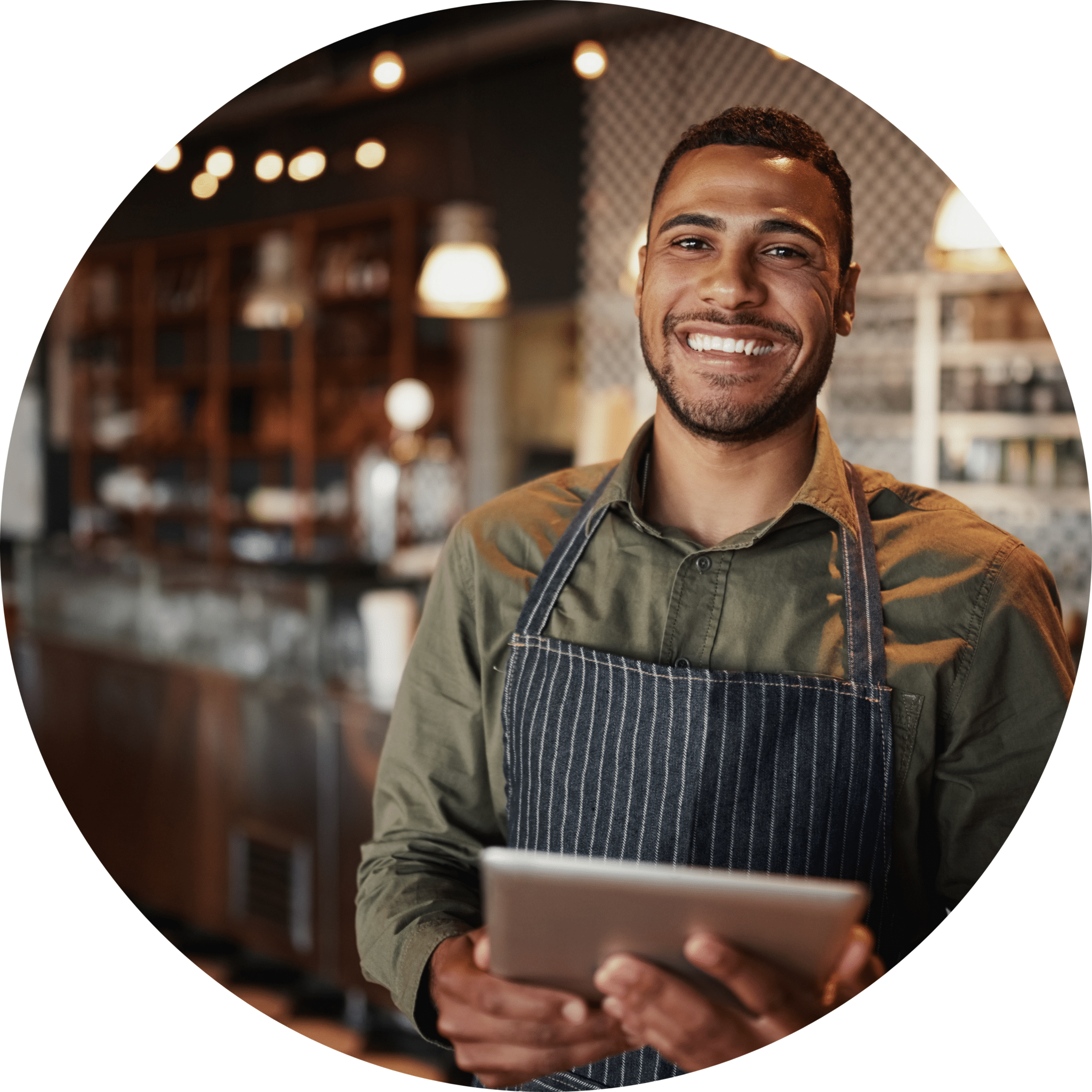 Barista holding tablet, barista in café