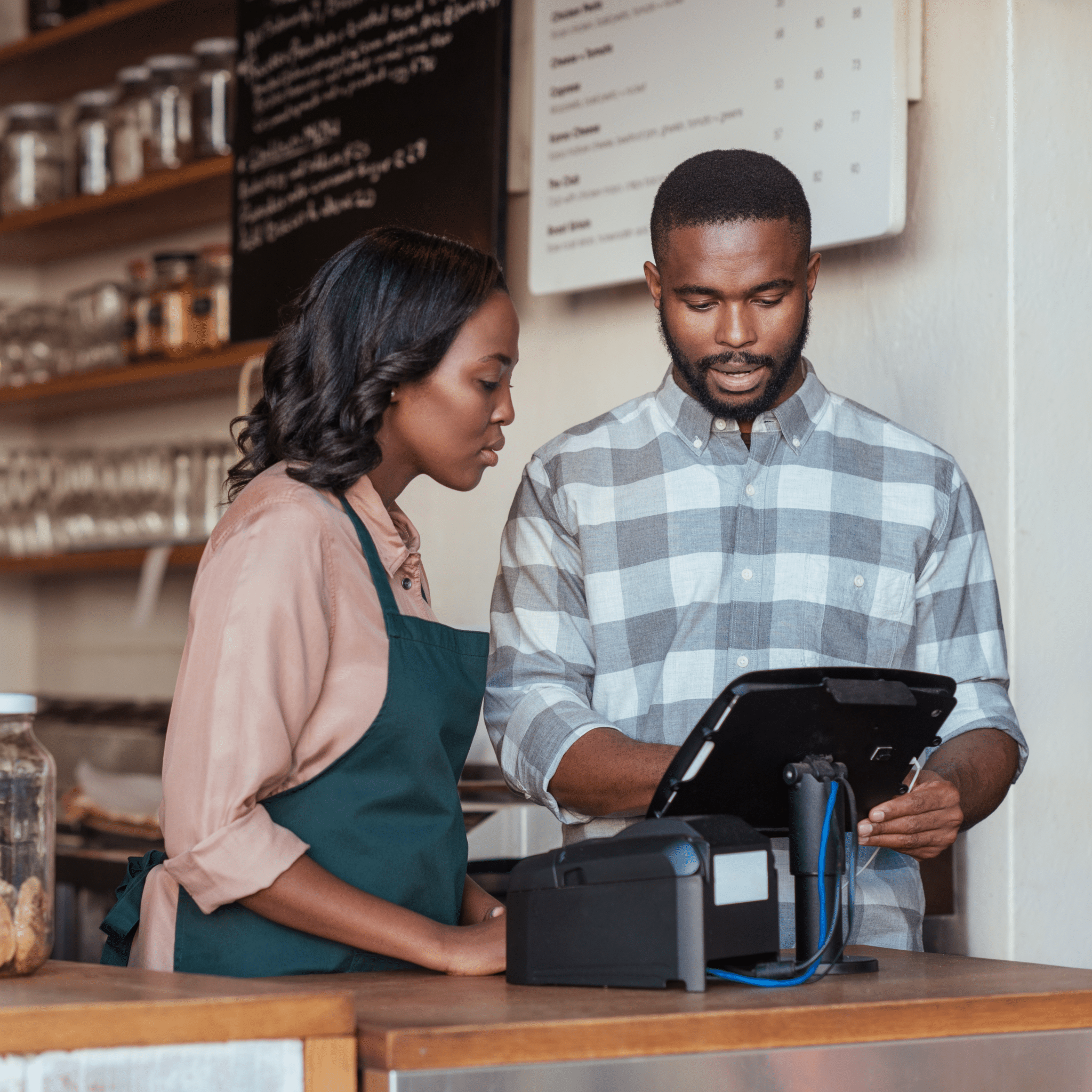 Baristas at café counter, barista training, coffee and tea café