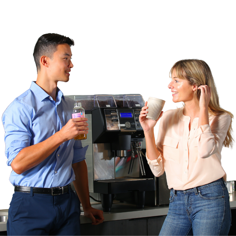 Employees talking at a coffee machine, self-serve coffee machine, single serve coffee, ptwmt coffee and tea
